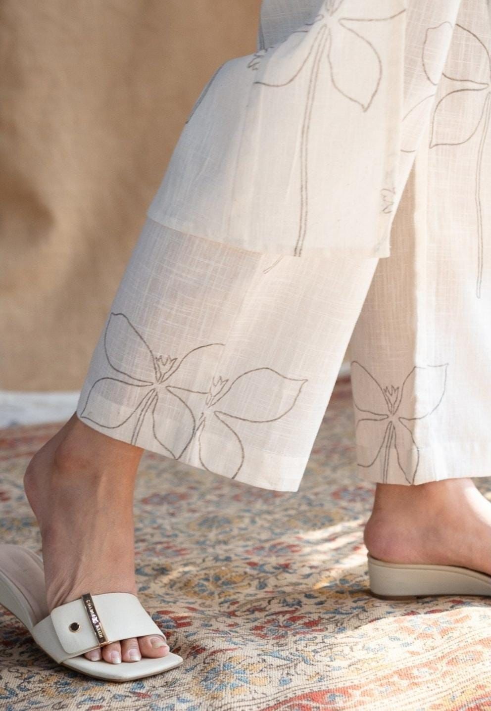 Ivory Minimalist Floral Kurta and Trouser Set